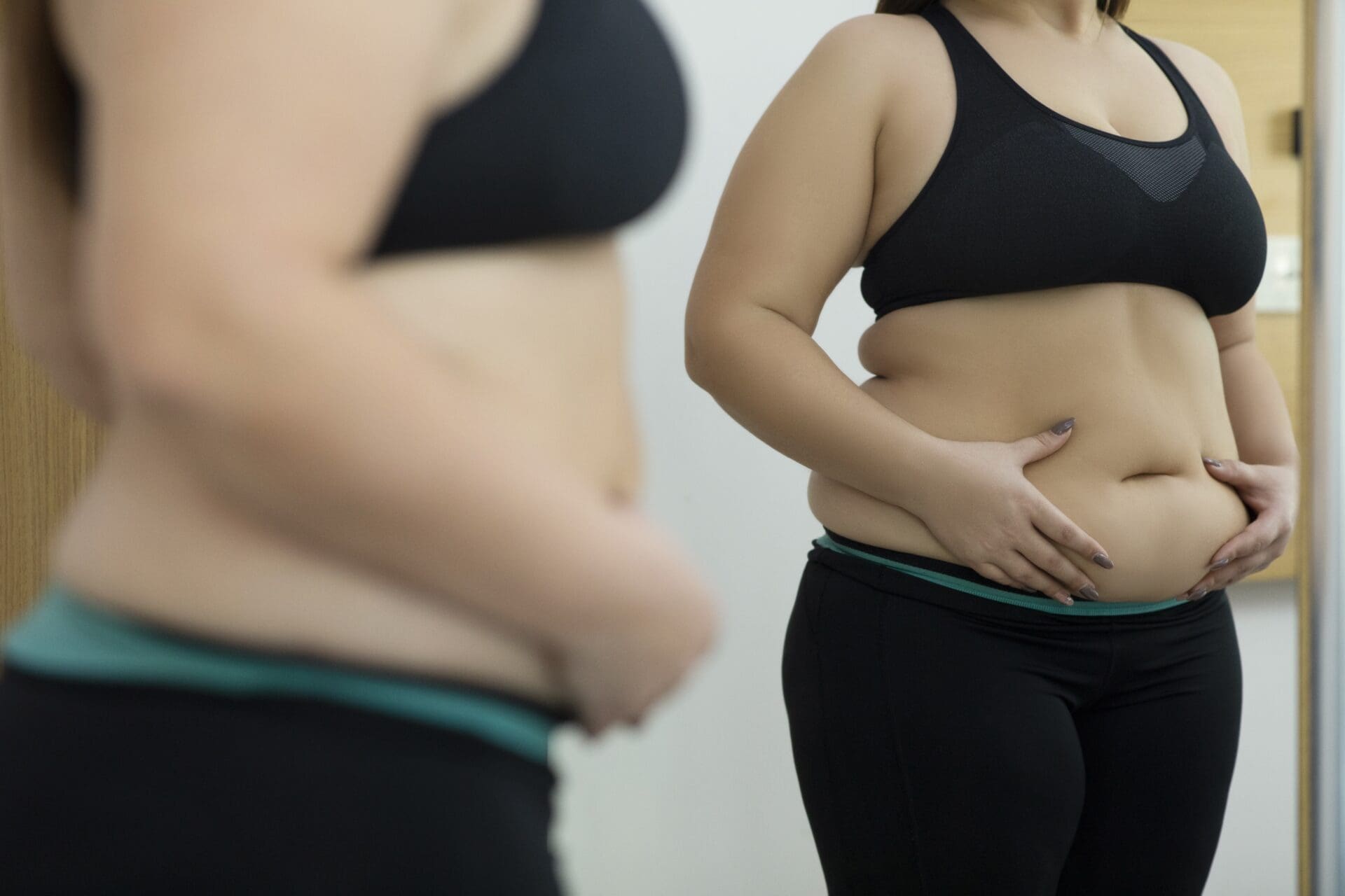 Woman with fat abdomen